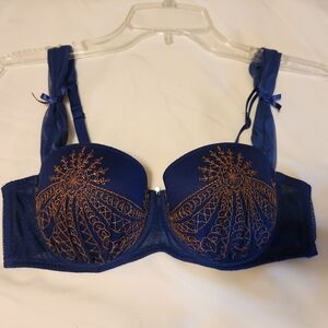 Blue bra with gold lace decoration